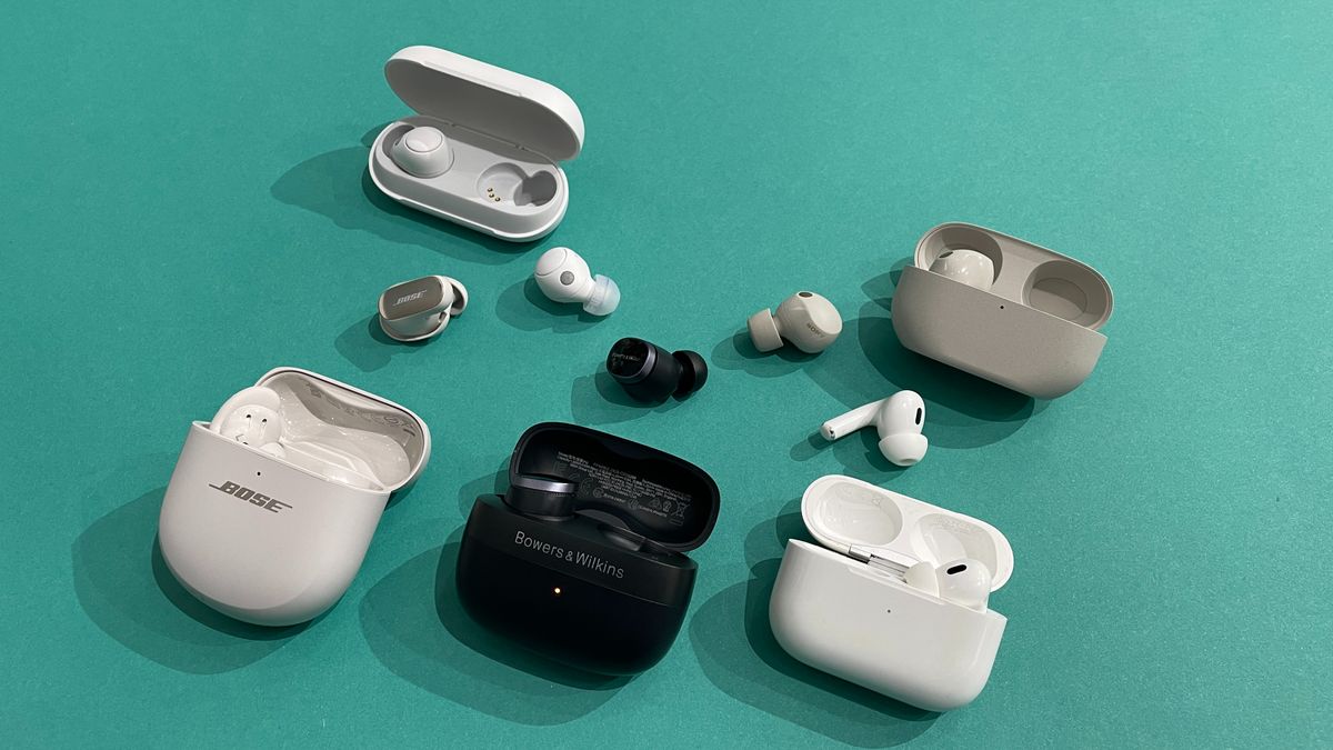 Bose, Sony, Apple and Bowers & Wilkins wireless earbuds lined up and out of their cases